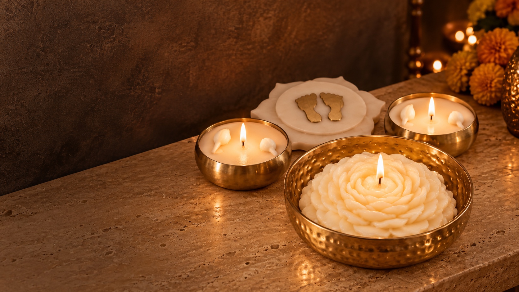 Diwali styling inspiration: MIA’s ivory floral candle and golden bowls glowing in a warm, intimate home